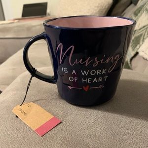 “Nursing is a work of heart” mug